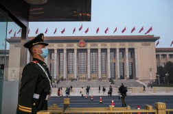 BEIJING, CHINA - MARCH 10: A police officer stands guard before the closing session of the Chinese People's Political Consultative Conference (CPPCC) at the Great Hall of the People on March 10, 2022 in Beijing, China. (Photo by Kevin Frayer/Getty Images)