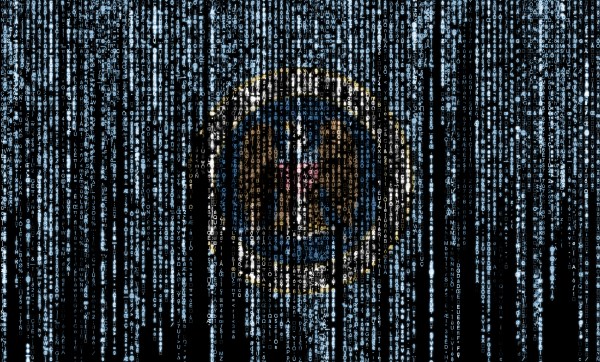 Flag of the National Security Agency on a computer binary codes falling from the top and fading away. (Getty Images)