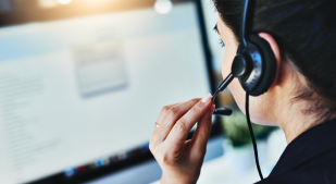 Call center agent viewing a monitor.
