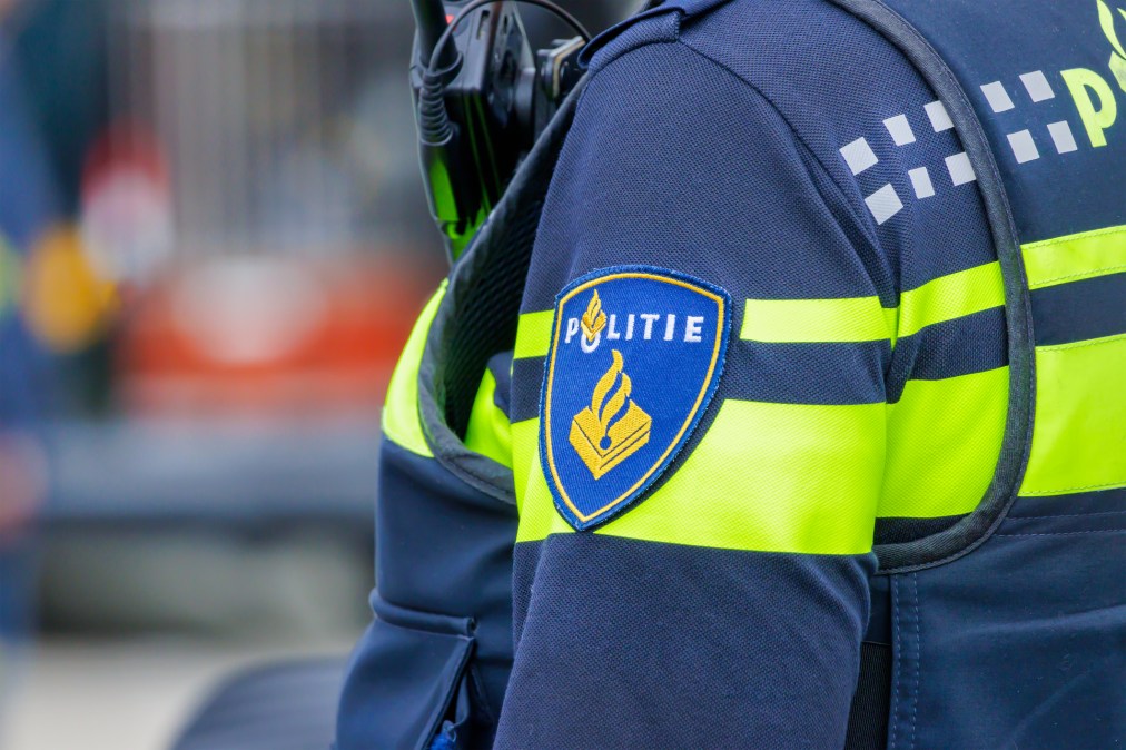 Close up of a Dutch police uniform with official badge in The Netherlands.